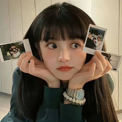 照片的她